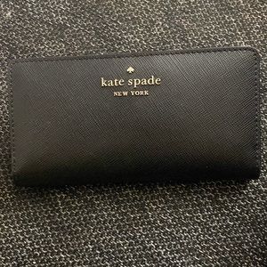 Kate Spade wallet. Used once. Too small for my liking.